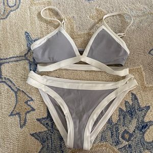 This is a beautiful bathing suit only worn one time- perfect condition.